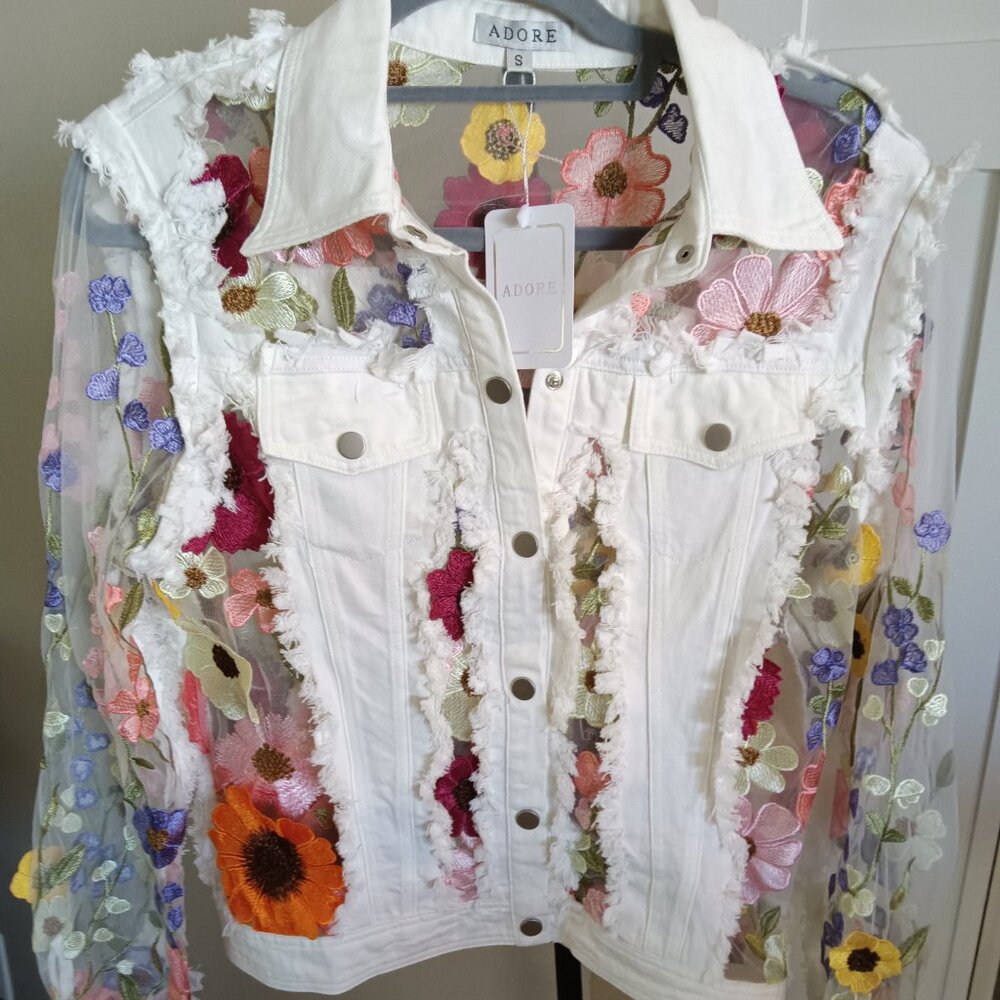 A new Adore white denim jacket with flower power!